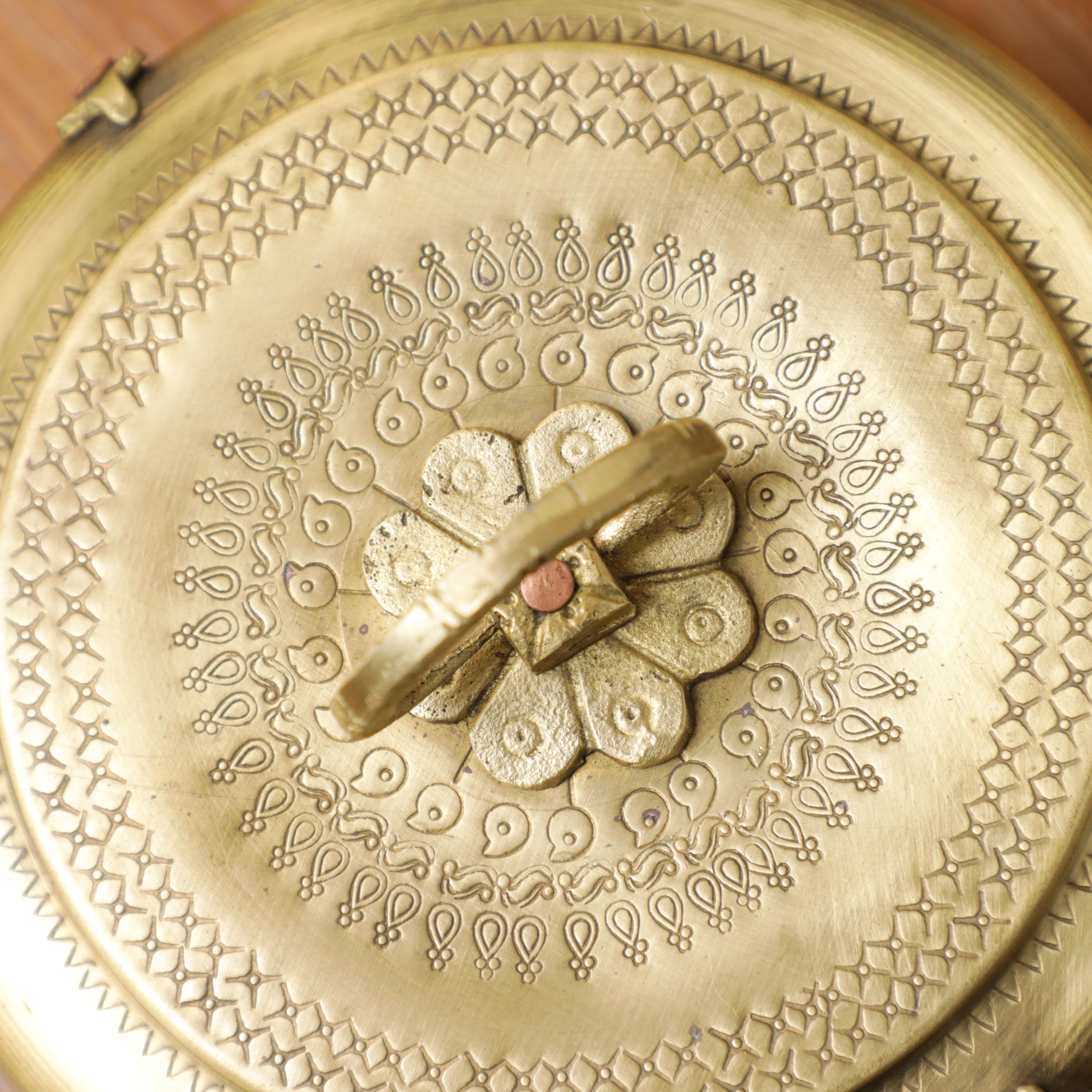 hand craved design on the storage brass box