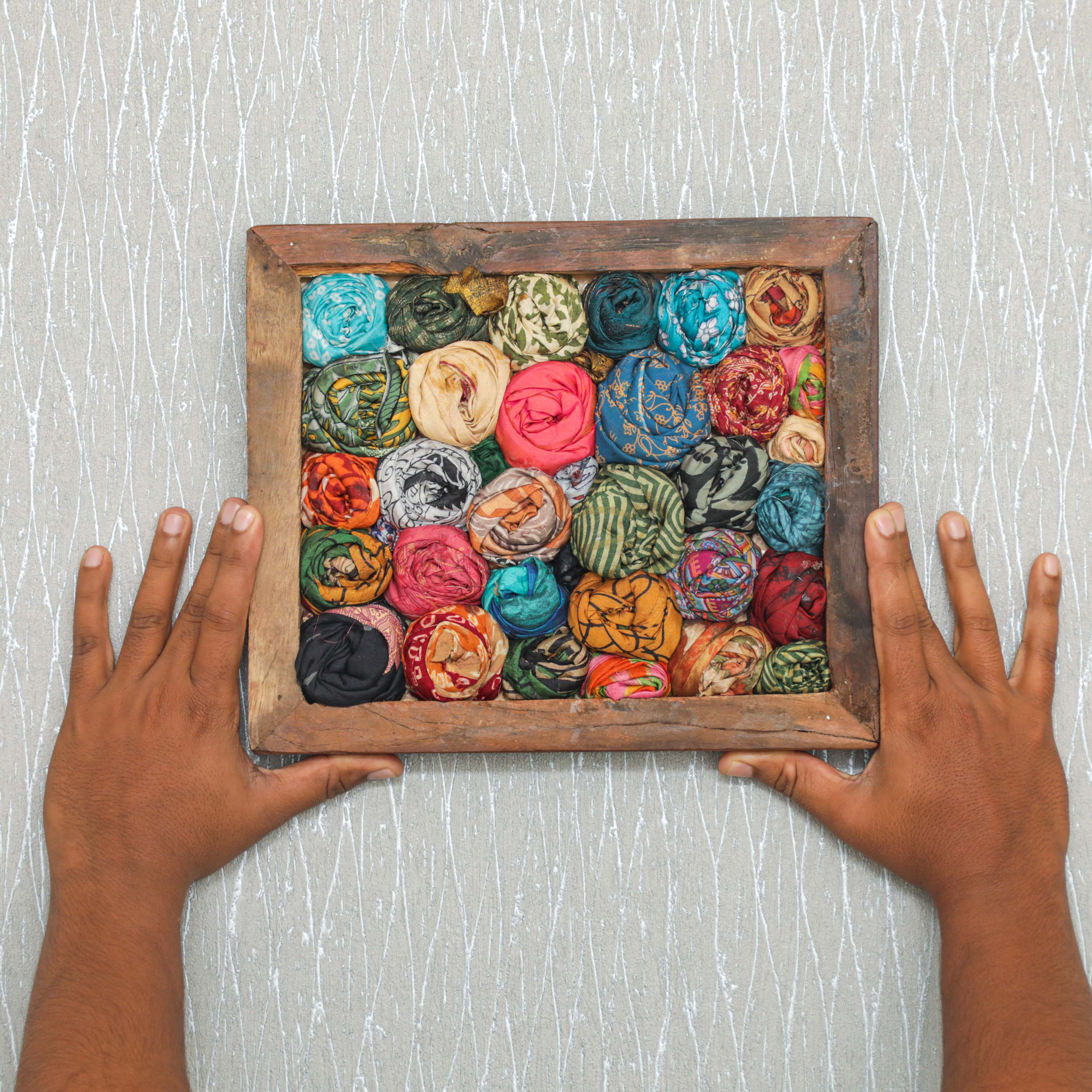 a indian style textile wall hanging frame