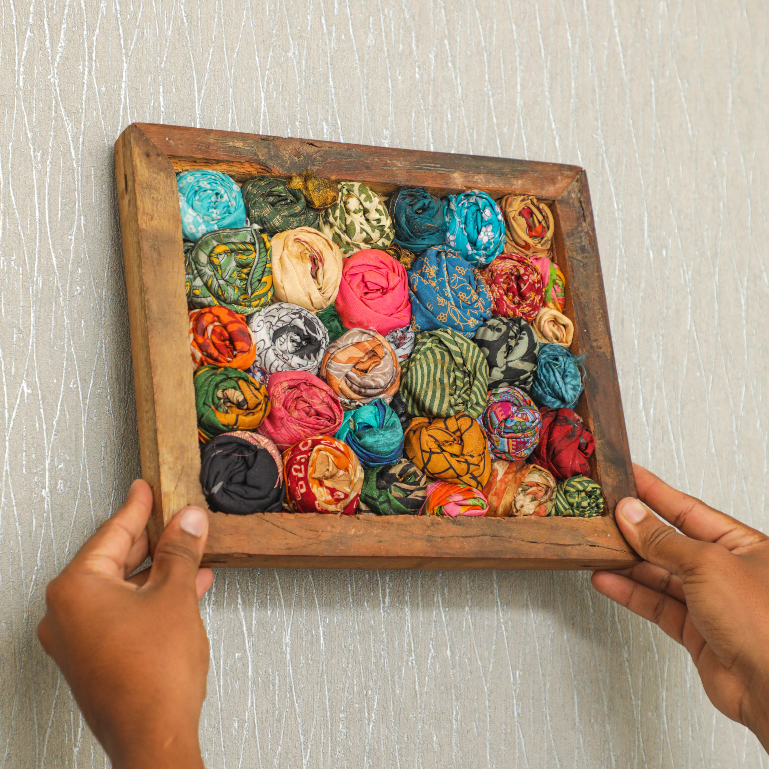 a rustic wooden wall hanging frames