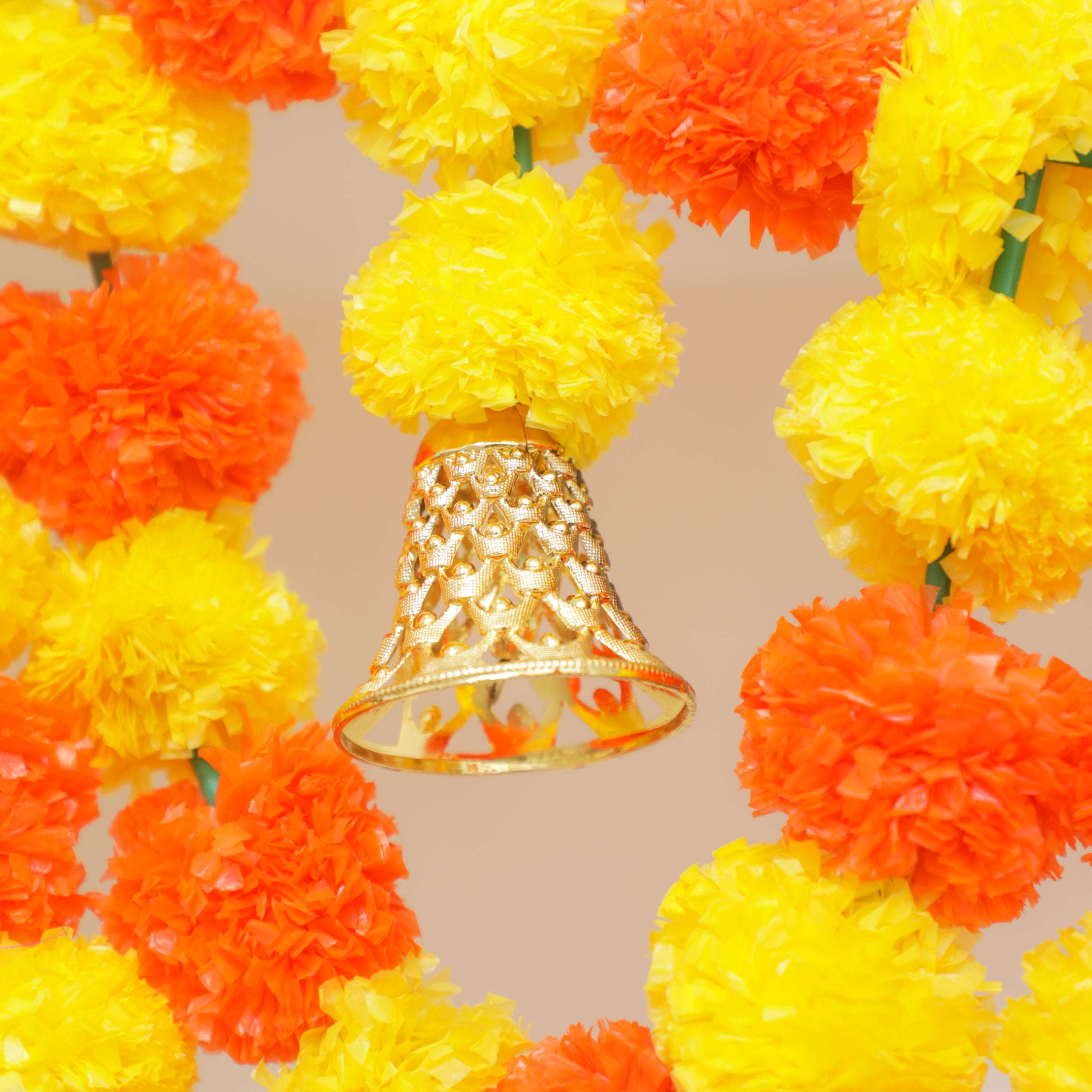Rich golden color bell attached at the end of toran