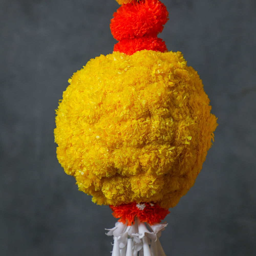 a stunning decor accent adorned with vibrant artificial flowers