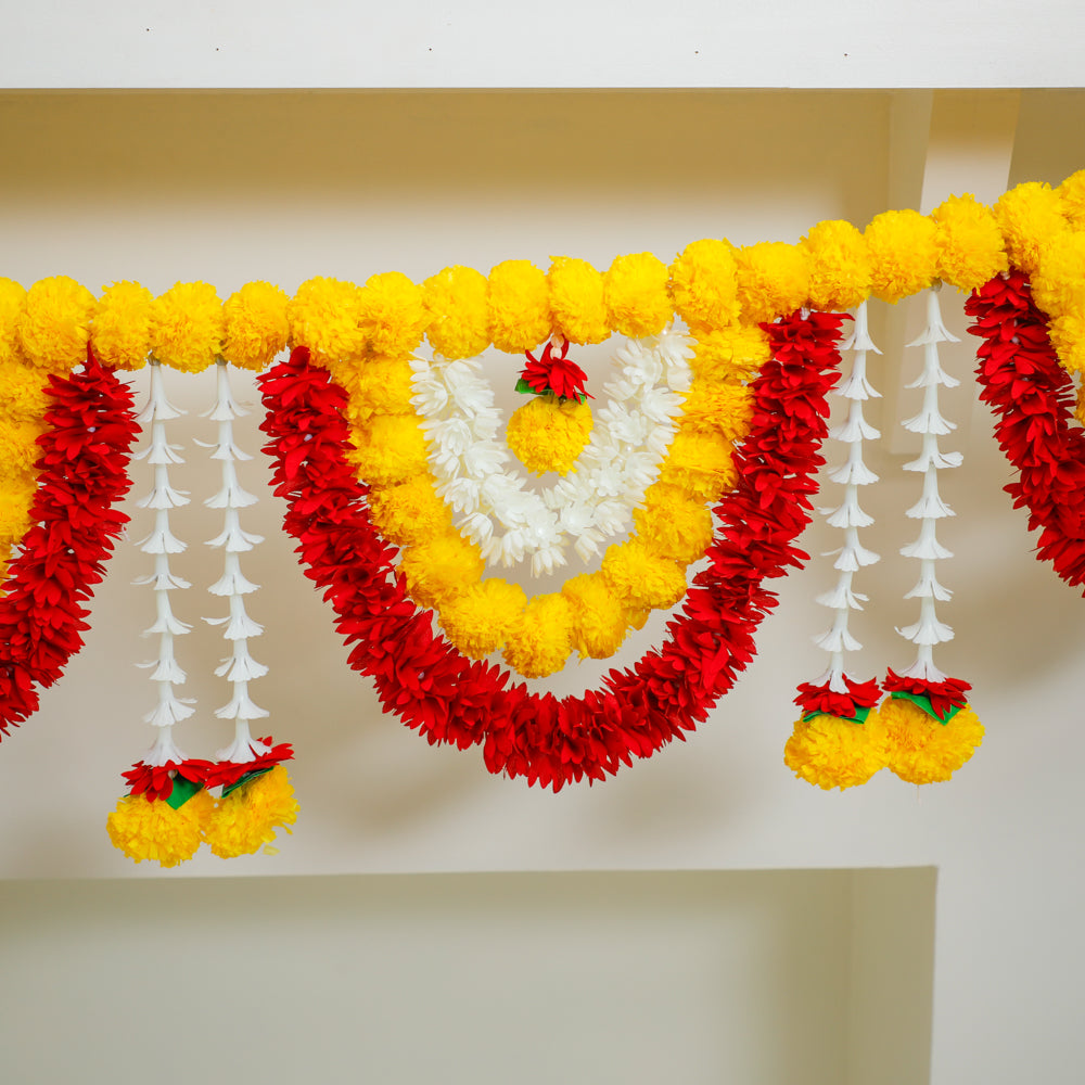 Handcrafted by women artisans in rural India using artificial flowers.