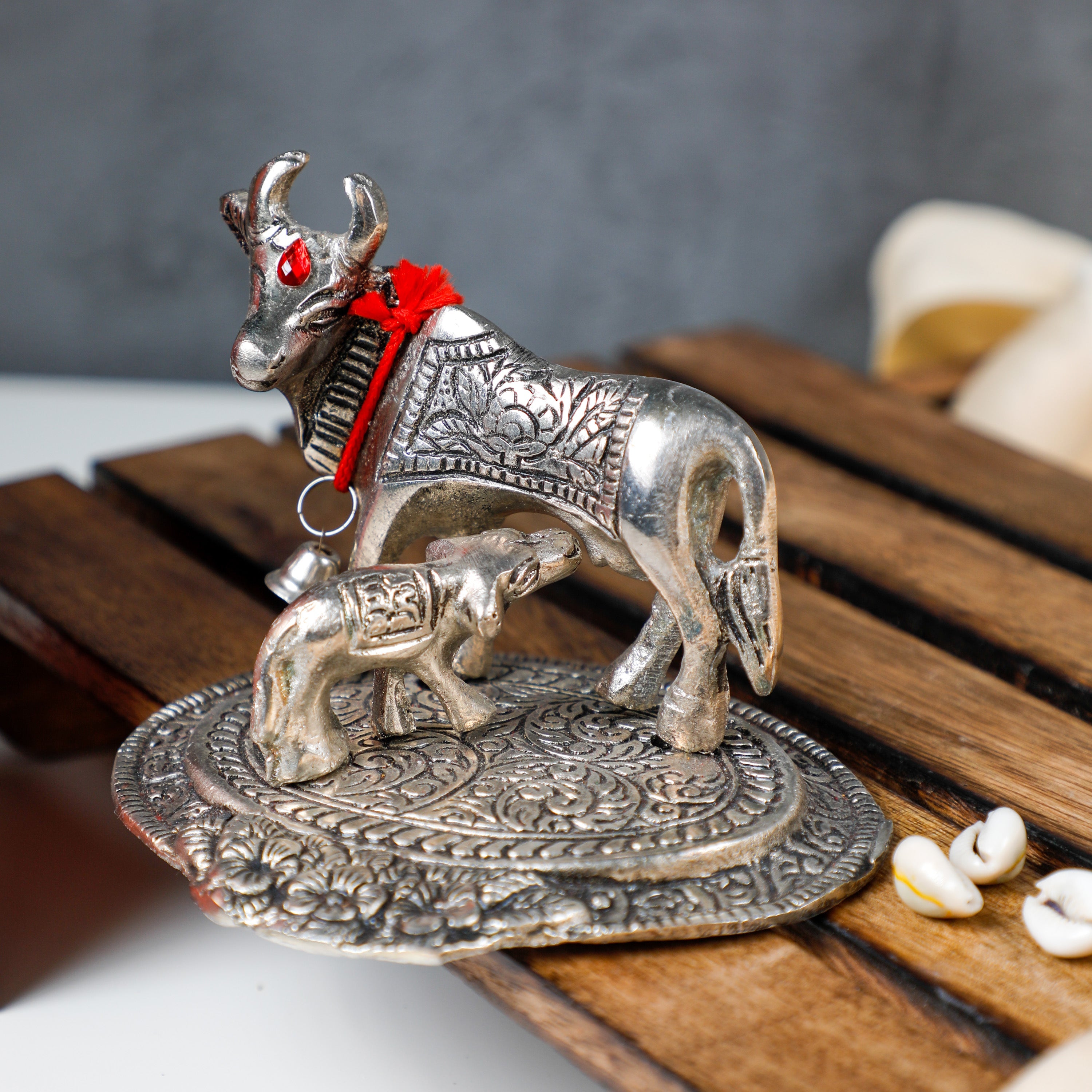 Coated in Silver this figurine adds charm to any space you introduce it to.
