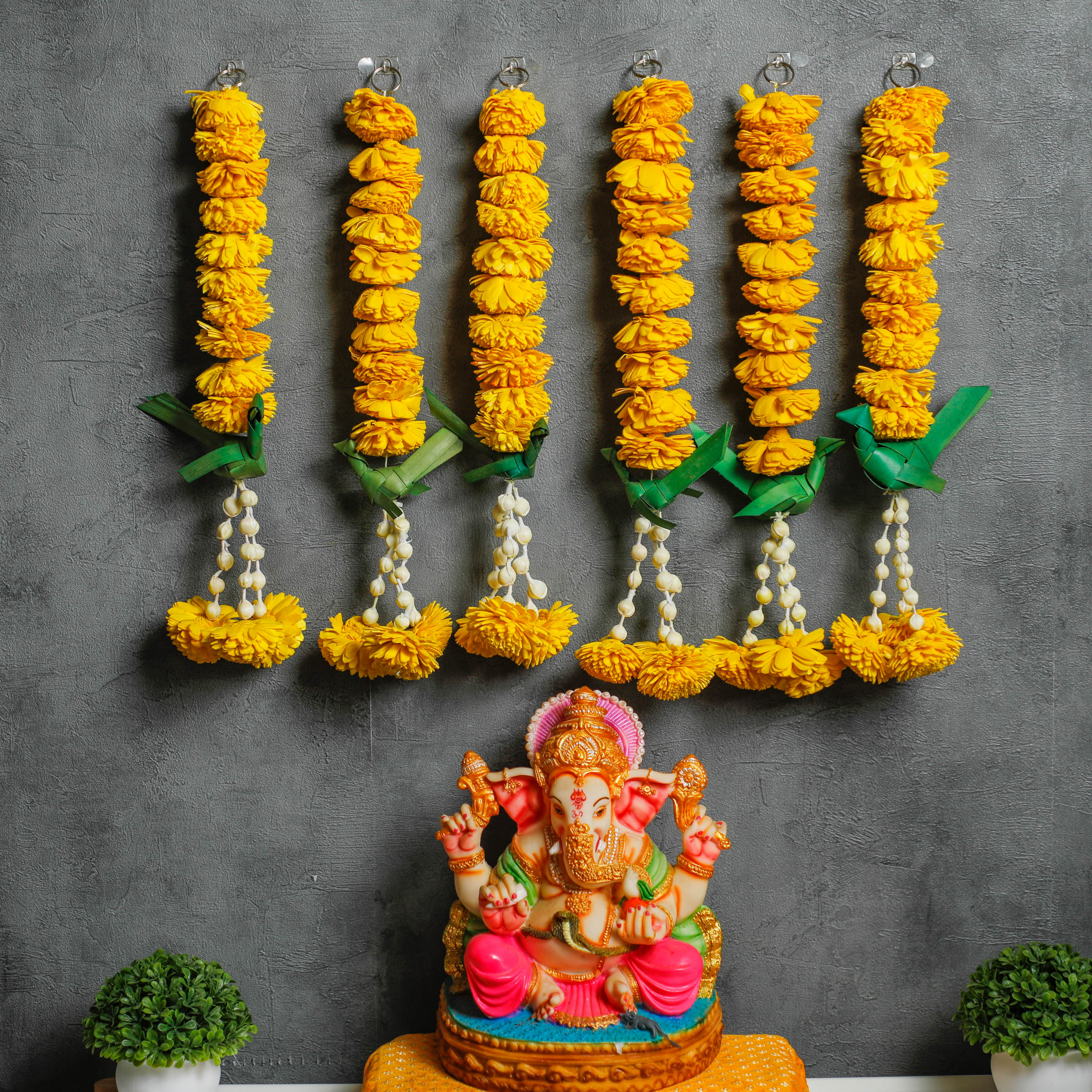 mesmerizing Palm Parrot & Shola Flower hanging garland