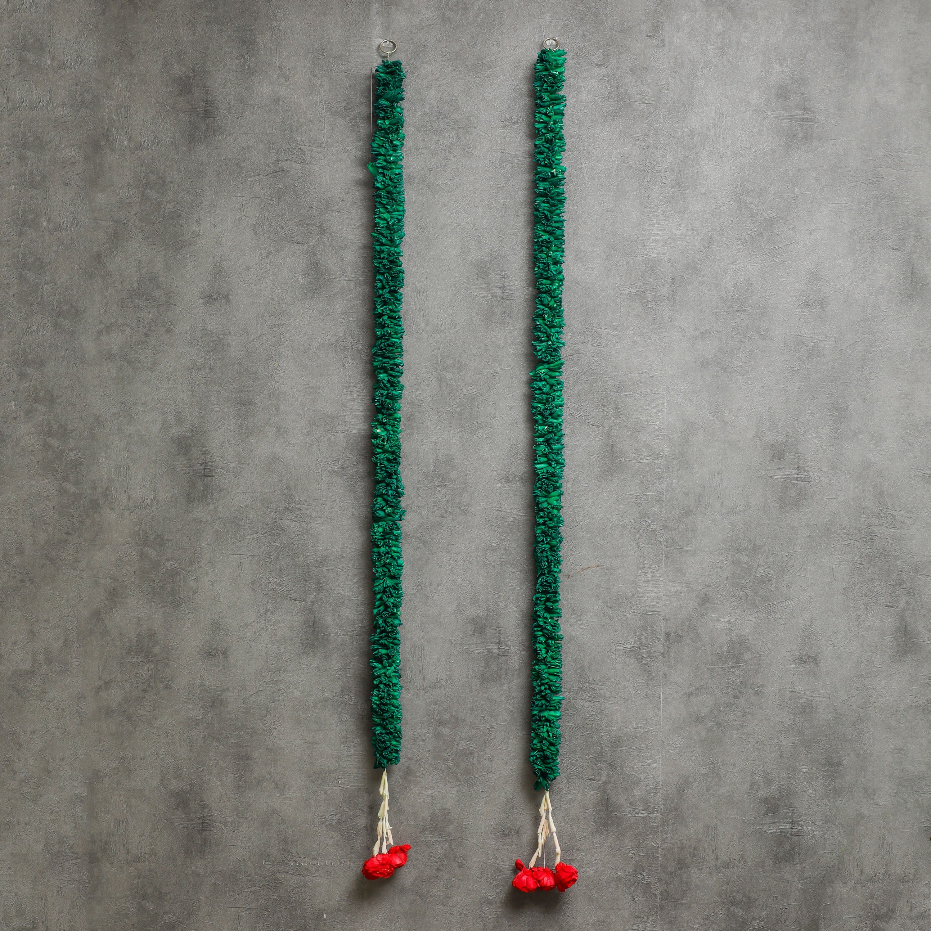 gracefully crafted from sholapit flowers, measuring 5ft in length
